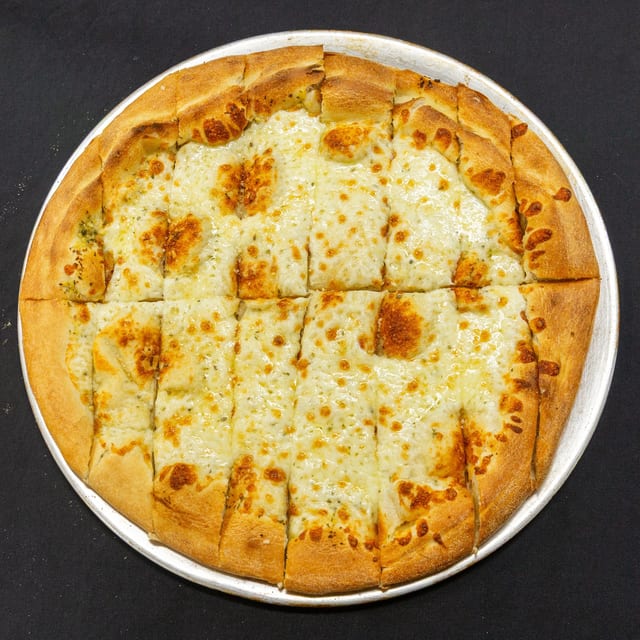 Our Nearly Famous Cheesy Garlic Bread Sticks.